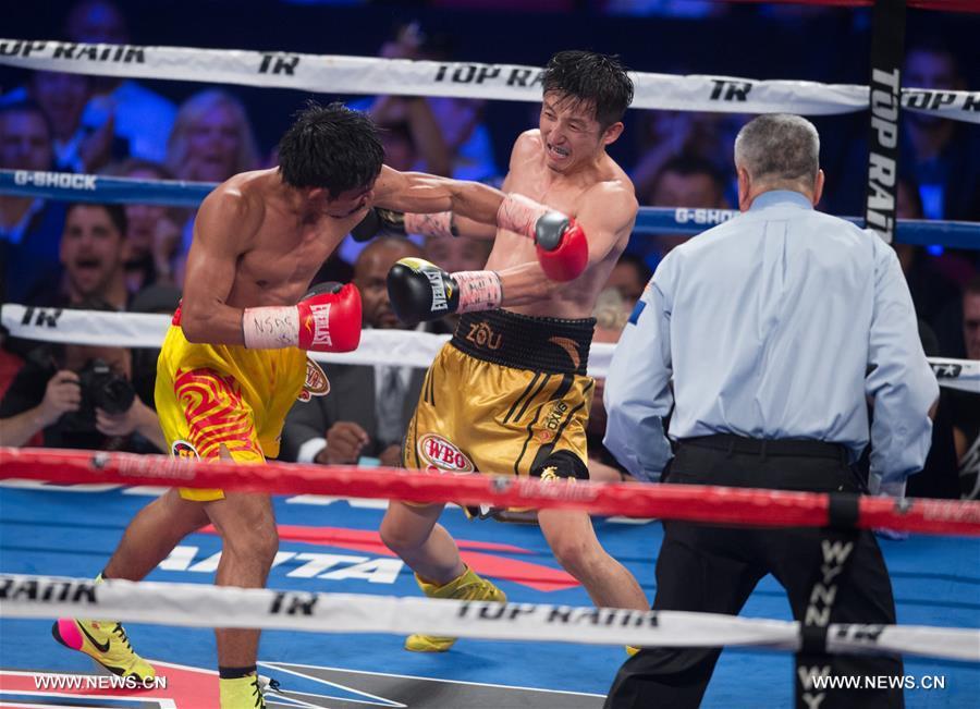 （体育）（6）拳击&mdash;&mdash;邹市明首夺世界拳王金腰带 实现拳击生涯&ldquo;全满贯&rdquo; 