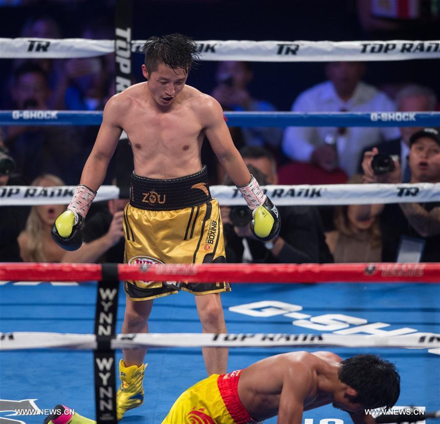（体育）（7）拳击&mdash;&mdash;邹市明首夺世界拳王金腰带 实现拳击生涯&ldquo;全满贯&rdquo; 
