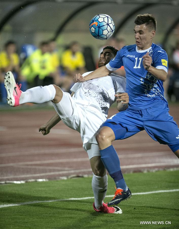 الصورة: منتخب إيران يفوز على نظيره الأوزباكستاني 2-0