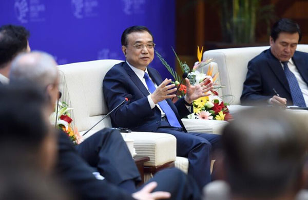 رئيس مجلس الدولة يشجع الاستثمار الأجنبى فى وسط وغرب الصين
