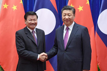 الرئيس الصينى يتعهد بتحقيق شراكة أكبر مع لاوس