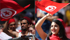 مشجعة تونسية في مباراة كأس العالم بين بلجيكا وتونس