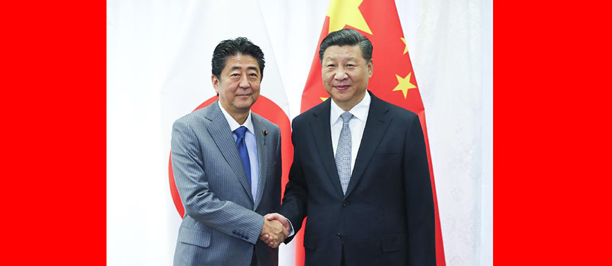 شي وآبي يبحثان تحسين العلاقات الصينية-اليابانية