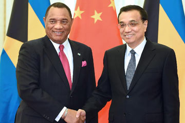 رئيس مجلس الدولة الصيني يجتمع مع نظيره من الباهاما