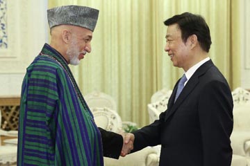نائب الرئيس الصيني يجتمع مع الرئيس الأفغاني السابق