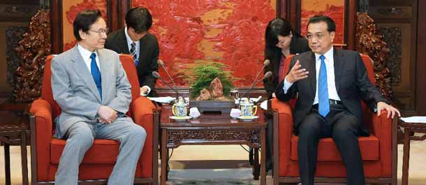 رئيس مجلس الدولة الصيني يجتمع مع مستشار الأمن الوطنى اليابانى