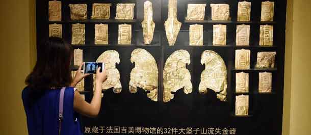 فرنسا تعيد 32 قطعة أثرية إلى متحف صيني