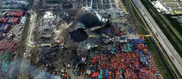 بالصور: طائرة الأخبار بدون الطيار لشبكة شينخوا تلتقط صور موقع الانفجار بتيانجين