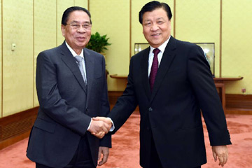 مسئول كبير بالحزب الشيوعى الصينى يتعهد بإقامة علاقات اوثق مع لاوس