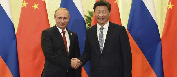 الرئيس الصيني يشدد على الالتزام بتطوير العلاقات مع روسيا