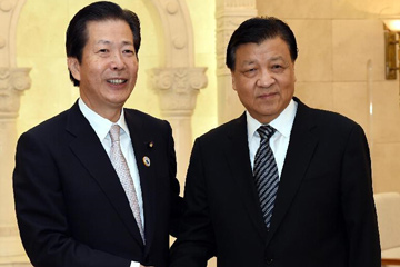مسؤول صيني بارز يلتقي بزعيم حزب كوميتو الياباني