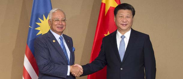 شى يتعهد بمنح "اولوية" للعلاقات مع ماليزيا فى دبلوماسية الجوار الصينية