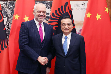 الصين وألبانيا تتعهدان بتعزيز التعاون الثنائي