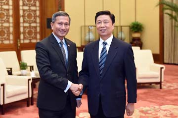 نائب الرئيس الصيني يلتقي بوزير خارجية سنغافورة