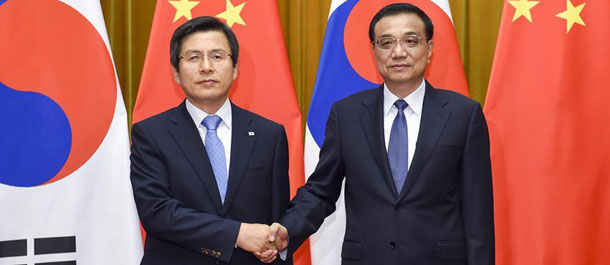 الصين وجمهورية كوريا تتعهدان بتعزيز العلاقات