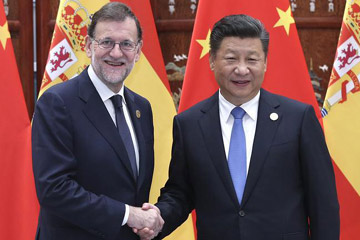 الصين وأسبانيا تتعهدان بتعزيز الترابط بينهما