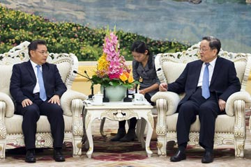 كبير المستشارين السياسيين الصينيين يلتقي بوفد من لاوس
