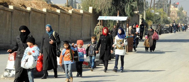 عودة المدنيين إلي ديارهم في مدينة التل السورية بعد سيطرة الحكومة عليها