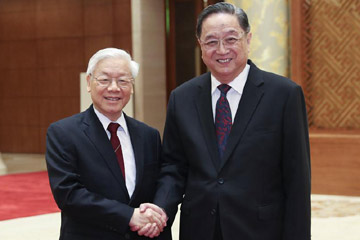 كبير المستشارين السياسيين الصينيين يبحث مع الأمين العام للحزب الشيوعى الفيتنامي العلاقات 
الثنائية