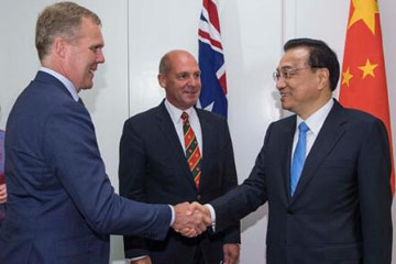 رئيس مجلس الدولة الصيني يلتقي بالساسة الأستراليين الرفيعي المستوى