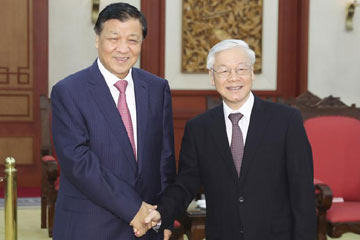 مسؤول بارز بالحزب الشيوعي الصيني يلتقي رئيس الحزب الشيوعي الفيتنامي