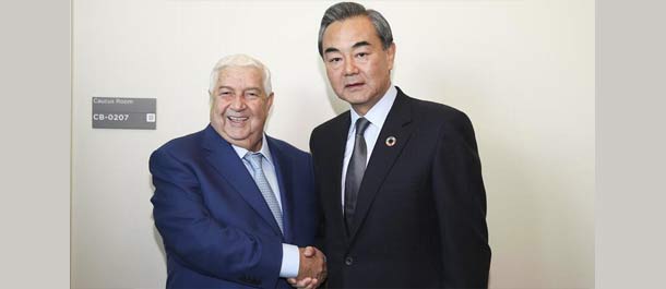 وزير الخارجية الصيني يلتقي نائب رئيس الوزراء السوري