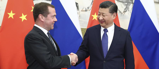 شي يؤكد على الالتزام بتطوير العلاقات الصينية الروسية